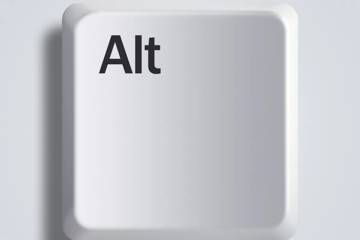 tecla Alt de teclado de computador em destaque com design simples e fundo claro